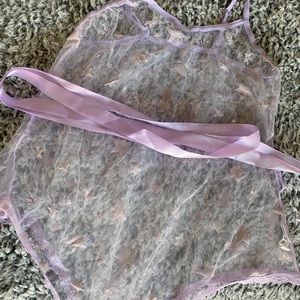 purple sheer body suit